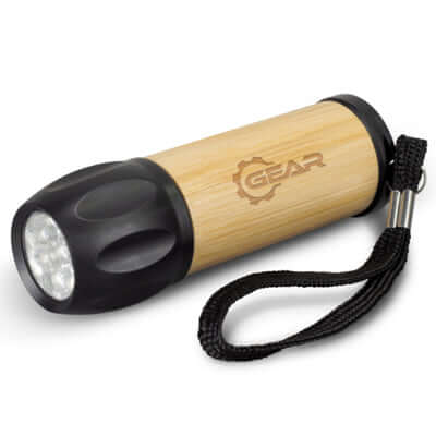 Navigator Bamboo Torch with woven wrist strap and LED lights, ideal as a corporate gift.