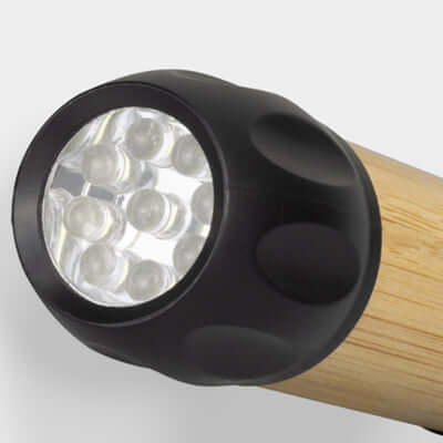Close-up of the Navigator Bamboo Torch showing LED light and bamboo design, ideal for corporate gift.