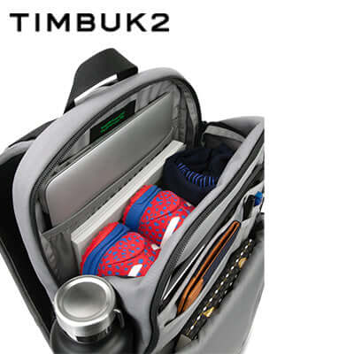 Timbuk2 Parkside Laptop Backpack 2.0 interior with laptop, sneakers, and organization pockets.