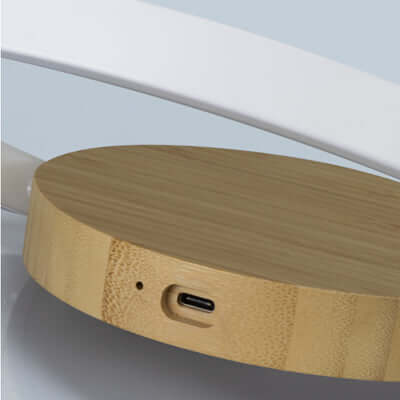Twilight Wireless Charging Night Light base made of bamboo featuring a USB-C port for wireless charging.
