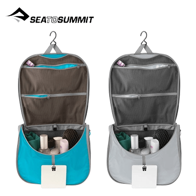 Sea To Summit Ultra-Sil Toiletry Bag Large in teal and gray with hanging hook and various compartments for toiletries.