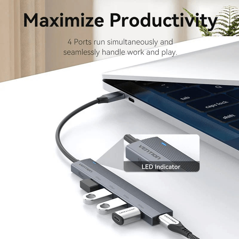 Vention 5-in-1 USB-C Mini Hub connected to a laptop, showcasing 4 ports for seamless connectivity.