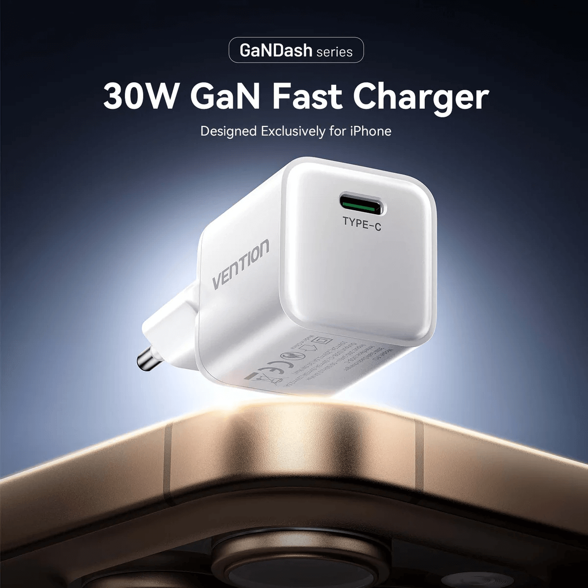 Vention 1-Port GaN Charger (30W) on a surface with a smartphone, showcasing fast charging features.