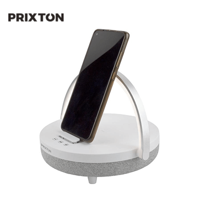 Prixton 4-in-1 10W Bluetooth Speaker with LED light and Wireless Charging Base on display with smartphone.
