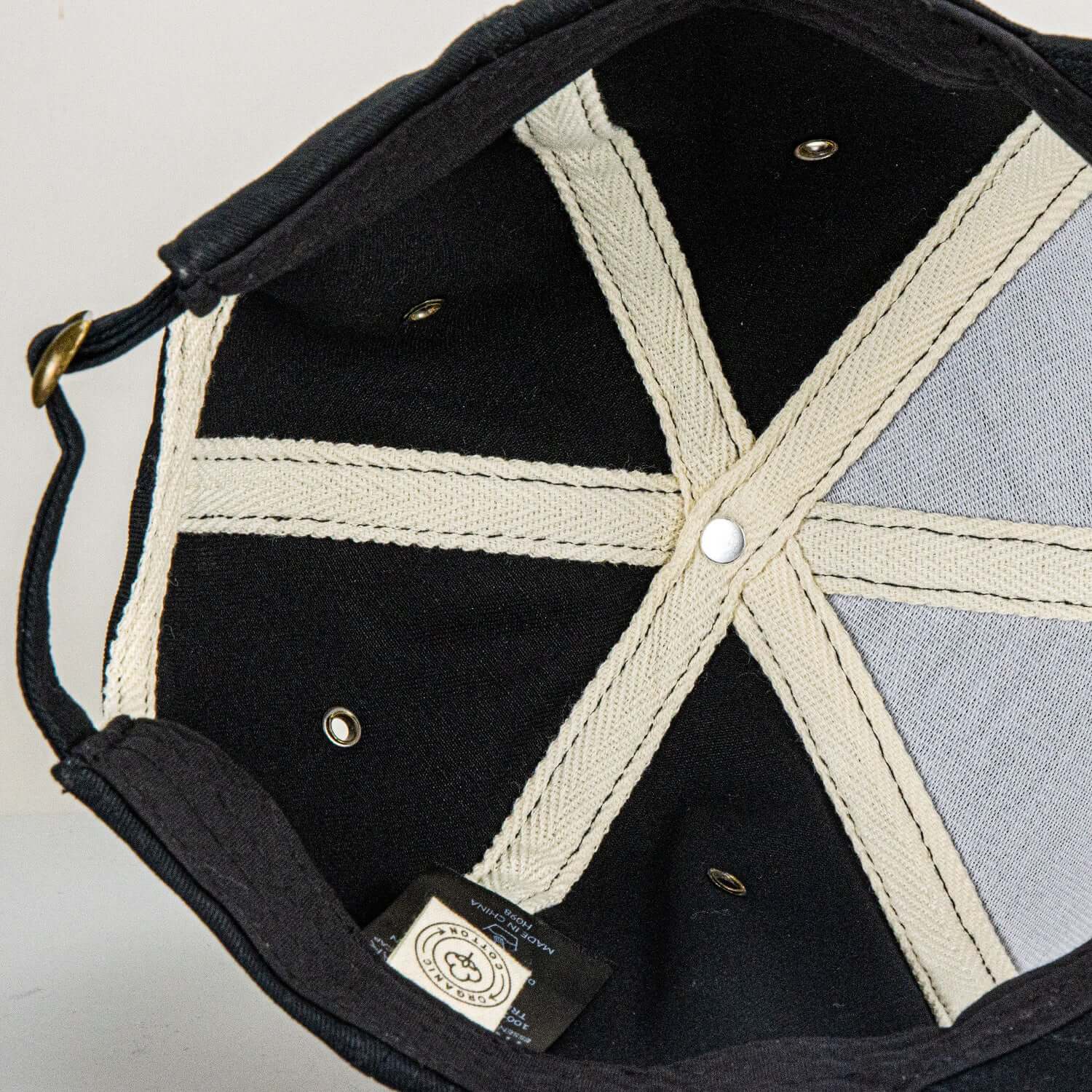 Inside view of Essence Organic Cap showcasing structured design and breathable fabric.