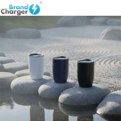 BrandCharger Sip Vacuum Cup trio displayed on stones, showcasing eco-friendly design for corporate gifts.