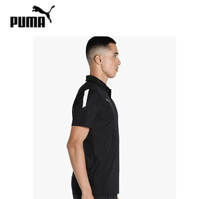 PUMA Teamliga Sideline Polo Shirt worn by a male model in a side view, showcasing its sleek design and eco-friendly materials.