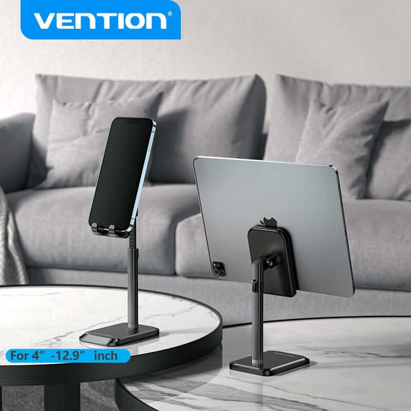 Vention Height Adjustable Desktop Cell Phone Stand displaying a phone and tablet on a stylish coffee table.