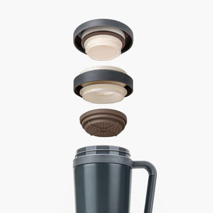 TYESO Thermos Office Tumbler with detachable lid components showcasing functionality and design.