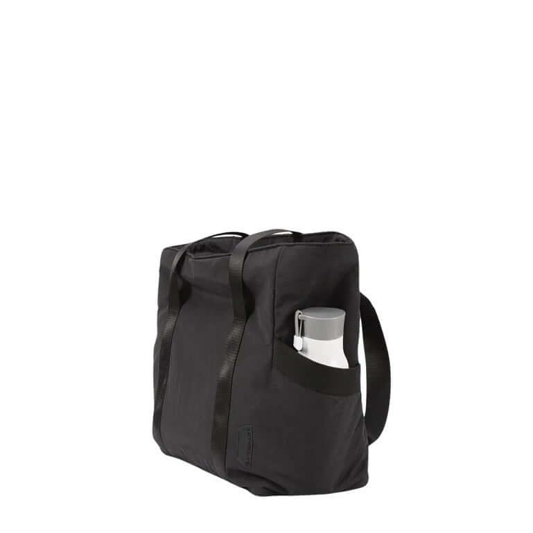 Bagsmart Zoraesque Tote in black with a water bottle in side pocket, ideal for work, school, or casual outings.