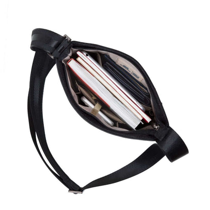 Rivacase Cardiff Canvas Crossbody Bag interior view with notebooks and tablet, ideal corporate gift