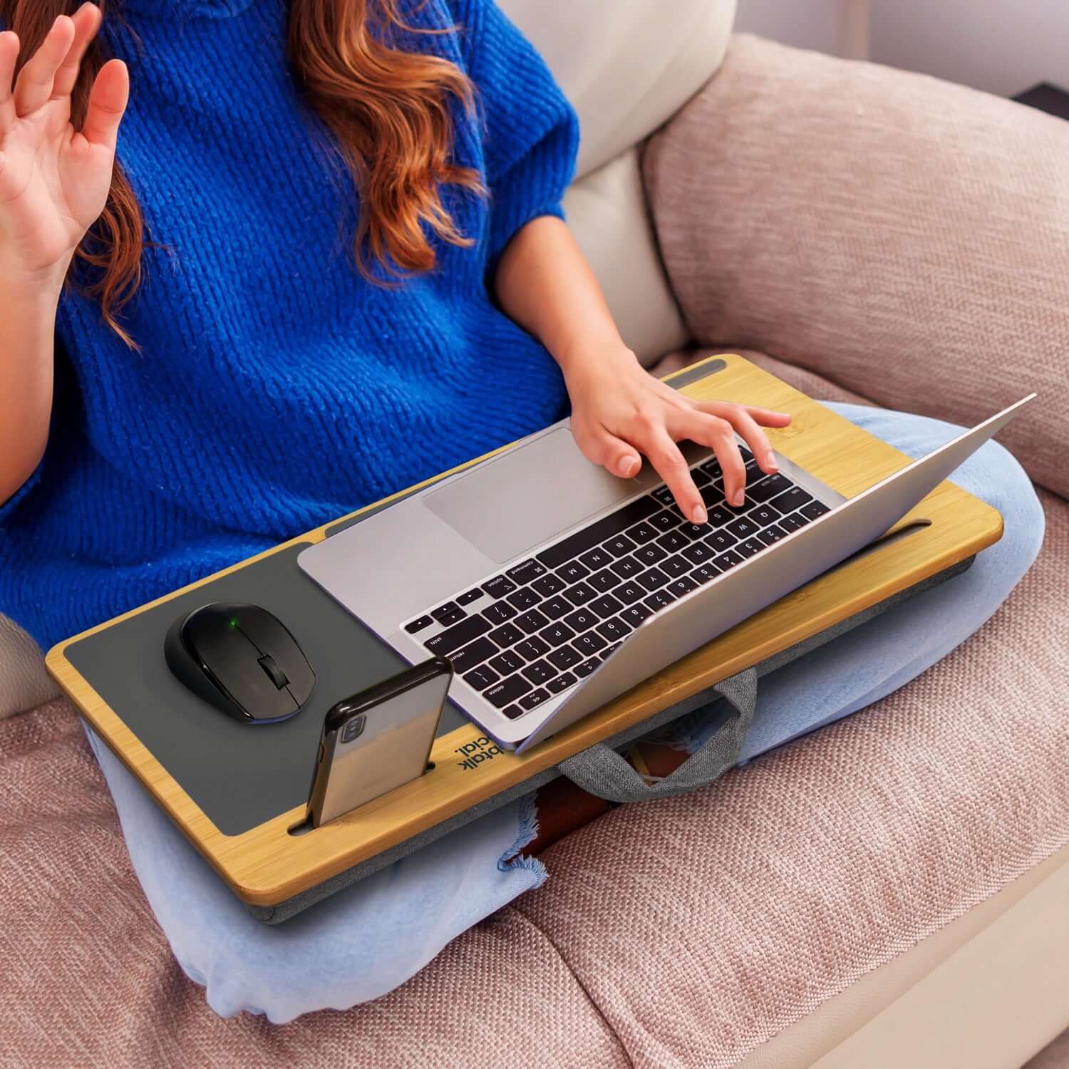 NATURA Bamboo Lap Desk featuring a laptop, mouse, and phone on a sofa for comfortable workspace.