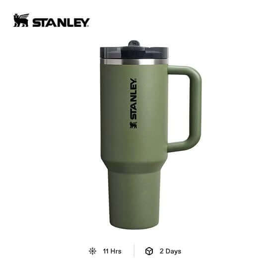 STANLEY The 40oz Quencher ProTour Flip Straw Tumbler in green with comfort grip handle.