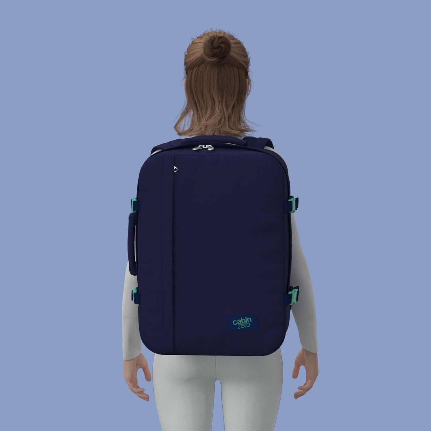 Cabinzero Classic Ultra Light Cabin Bag With Luggage Trackers 44L worn on back against a blue background.