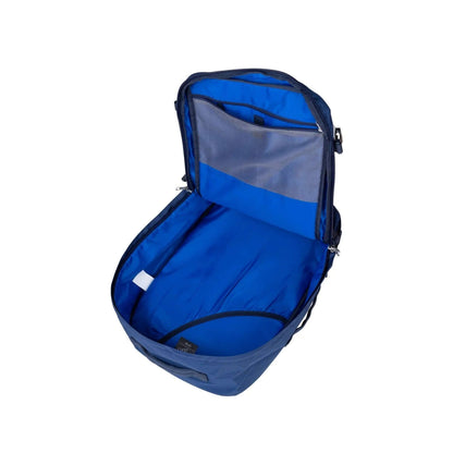 Interior view of Cabinzero Classic Plus Backpack 42L showcasing spacious blue compartment for organized packing.