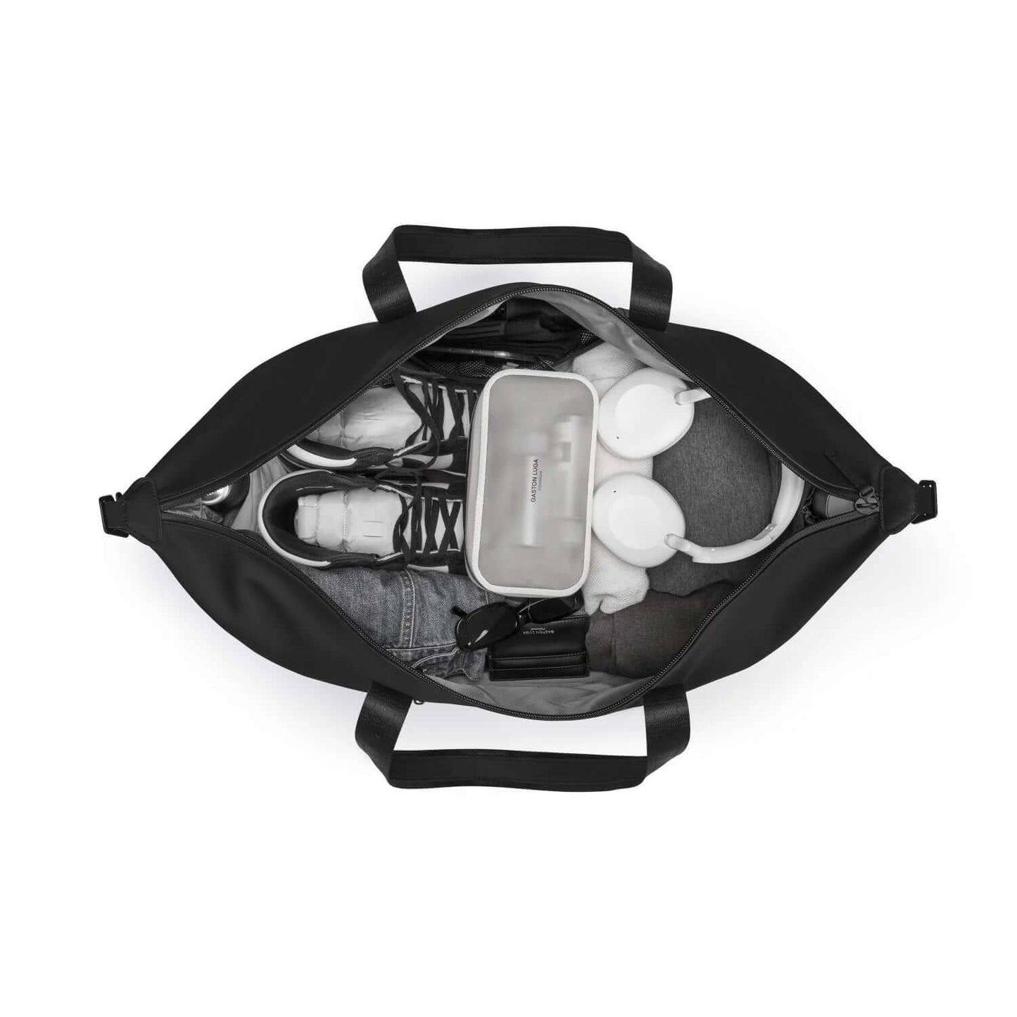 Interior view of the Gaston Luga Dash Weekender 2.0 Large bag showing organized items for travel.