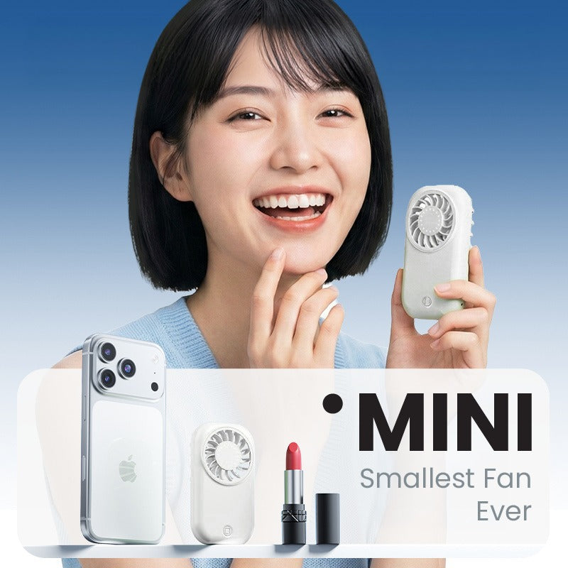 Typhoon Mini Turbo Fan displayed in hand, showcasing compact design, ideal for personal use and as a corporate gift.