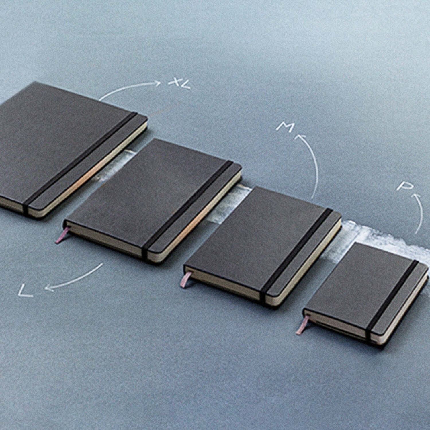 Moleskine Classic Hard Cover Notebook - Extra Large and other sizes displayed in a row, showcasing design and features.