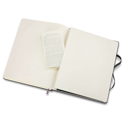 Open view of Moleskine Classic Hard Cover Notebook - Extra Large with blank ivory pages and a bookmark.