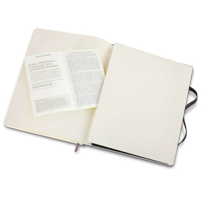Inside view of Moleskine Classic Soft Cover Notebook - Extra Large showing expandable inner pocket.