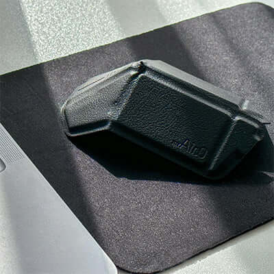 myAir.0 OriMouse on mouse pad, showcasing its sleek design suitable for a corporate gift.