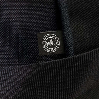 Close-up of the Recycled Ocean Plastic label on the Oceana Recycled Duffle Bag, showcasing its eco-friendly materials.