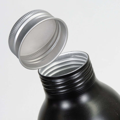 Close-up of the Octiva Aluminium Bottle with screw-on cap, showcasing its recycled aluminium design and lightweight structure.
