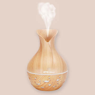 OTO Misty Humidifier elegant design with vapor mist, enhancing indoor air quality as a stylish corporate gift.