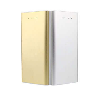 10000mAh Power Bank in gold and silver colors. Durable alloy and plastic casing for reliable charging.