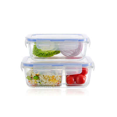 Microwavable Glass Lunch Box with 2 Compartment holding vegetables and salad.