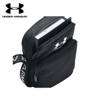 Under Armour Loudon Crossbody Bag in black with adjustable webbing straps and UA Storm technology for water resistance.