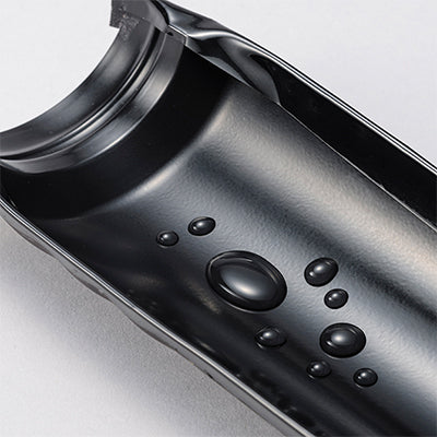 Close-up of the interior of the Kyocera 350ml Ceramic Coated Cerabrid Mug, showcasing water droplets.