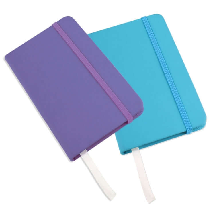 Pocket Size Notebook in blue and purple colors with elastic band and ribbon bookmark, perfect for jotting notes.