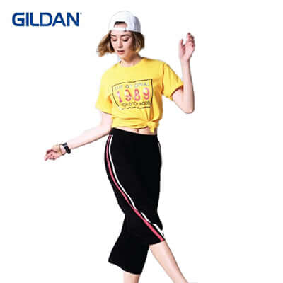 Gildan Hammer Adult T-Shirt worn by a model, styled with a trendy skirt, perfect for corporate gift ideas.