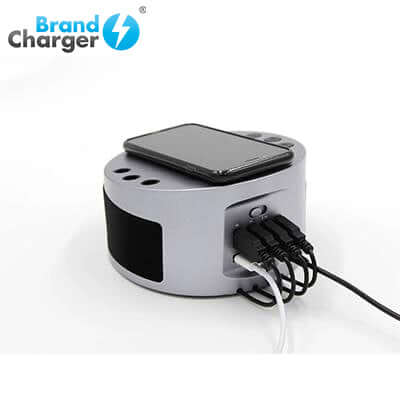 BrandCharger LYNQ Desktop Holder with Speaker and USB Hub showcasing charging ports and a smartphone on top.