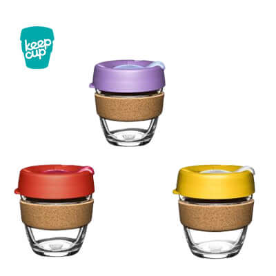 KeepCup Brew Cork Cup 8oz in three colors: purple, red, and yellow, highlighting eco-friendly design.
