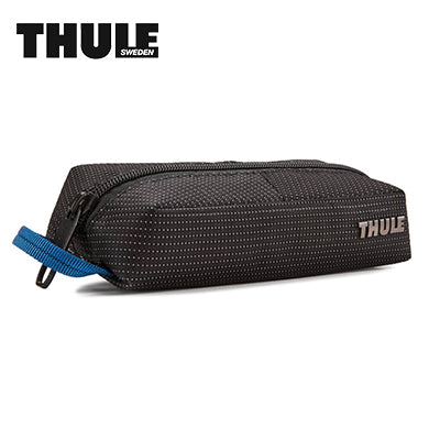 Thule Crossover 2 Travel Kit Pouch designed for organizing essentials easily on the go.