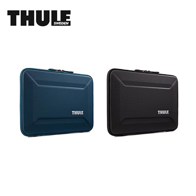 Thule Gauntlet Macbook Pro Sleeve in blue and black, offers rugged protection and style for laptops.