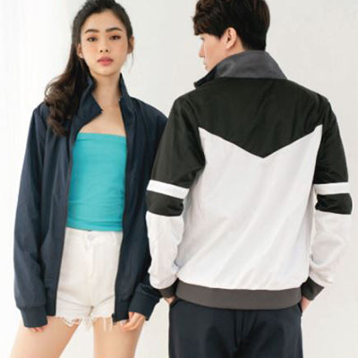 North Harbour Unisex Flipit Reversible Front Zip Jacket displayed on a model, featuring sleek design and versatile colors.