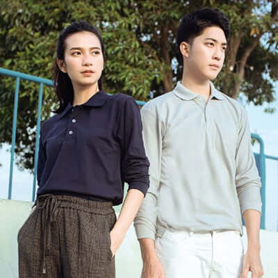 North Harbour 24400 Long Sleeve Soft-Touch Polo T-Shirt worn by models outdoors, showcasing style and comfort.