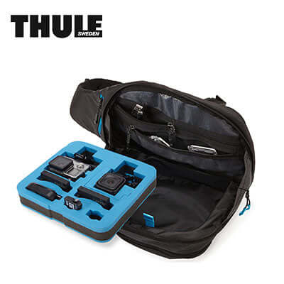 Thule Legend Gopro Sling Pack opened, showcasing compartments for cameras and accessories, ideal for adventure and corporate gift.