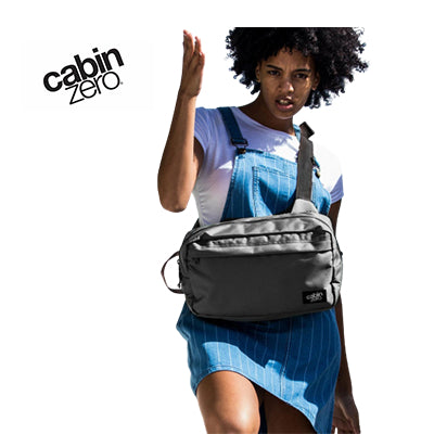 Woman wearing the Cabinzero Classic Cross Body 11L bag, perfect as a corporate gift for daily adventures.