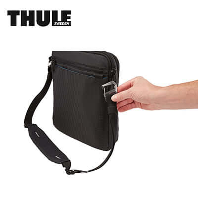 Thule Crossover 2 Crossbody Tote Sling Bag shown with hand adjusting strap, ideal for corporate gift.