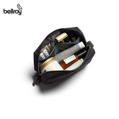 Bellroy Dopp Kit displayed with toiletries, ideal corporate gift for organization and travel.