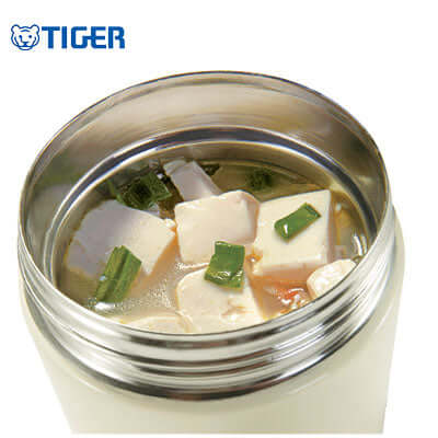 Tiger Stainless Food Jar 0.25L MCA-B filled with warm soup and vegetables, perfect for meals on the go.