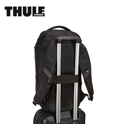 Thule Accent 28L Laptop Backpack shown mounted on luggage, ideal corporate gift for professionals.