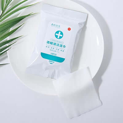 75% Alcohol Wet Wipes packet on a plate, ideal for on-the-go sanitization and corporate gift.