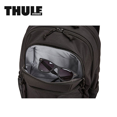 Thule Chronical 26L Laptop Backpack front pocket with sunglasses, perfect for campus life and corporate gift.
