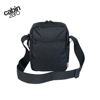 Cabin Zero Sidekick Sling Bag 3L in black with adjustable strap and front zip pocket for essentials.
