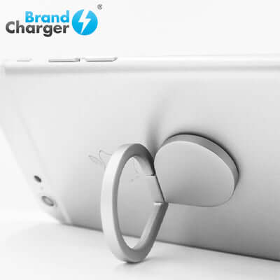 BrandCharger Ring Smartphone Ring Handle attached to a smartphone, showcasing its innovative grip and kickstand features.